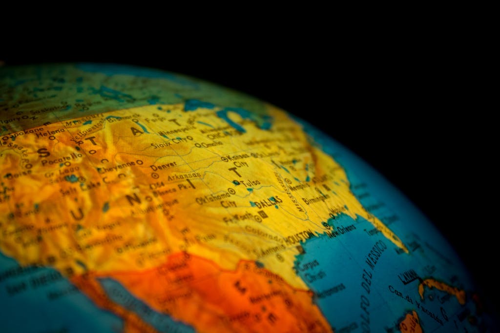 Vibrant close-up of a globe displaying North America in detail, highlighting the USA.